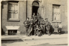 'Some of the chaps outside the billet. Russel St, Cambridge.'